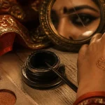 Maquillage indien traditionnel, kajal noir et fards doré-cuivré
